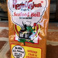 Packaging of Ragin' Cajun Seafood Boil mix on a wooden surface
