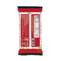 A clear plastic package of Acadian Kitchens Cajun Original White Beans featuring a vibrant red and black label displaying a Nutrition Facts panel and a Certified Cajun emblem