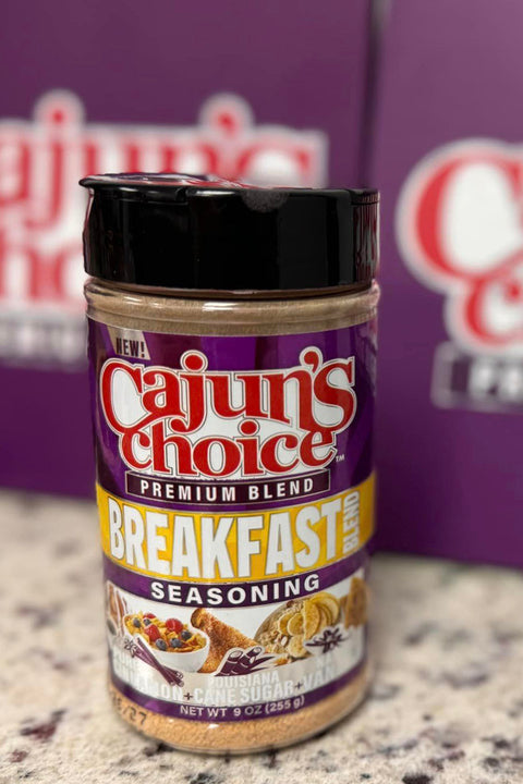 Cajun's Choice Breakfast Seasoning jar on a countertop with brand packaging in the background.