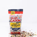 Photograph of a Ragin' Cajun Seasoned 10 Bean Soup package featuring a "New Look" banner and a chef alligator mascot on a white background with a colorful spill of diverse dry beans and legumes scattered around