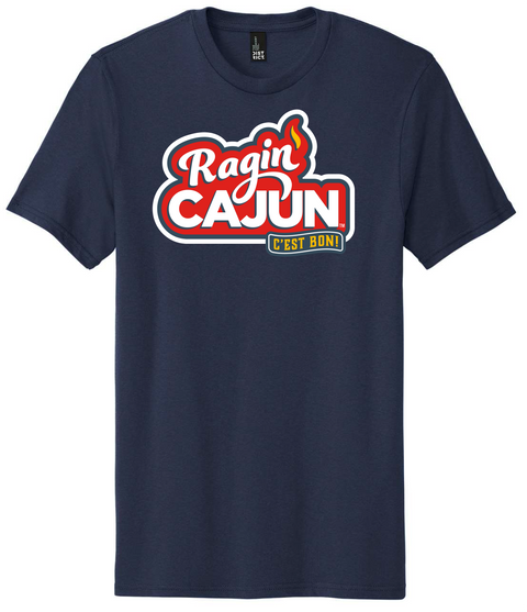 DISTRICT brand navy blue t-shirt displaying a vibrant red and white Ragin Cajun logo with an orange flame accent and a yellow C'EST BON banner