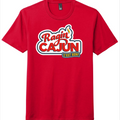 Red t-shirt by District featuring a Ragin' Cajun C'est Bon! logo with bold red script and block lettering, a small yellow flame detail, and the phrase C'est Bon! in a yellow and black banner
