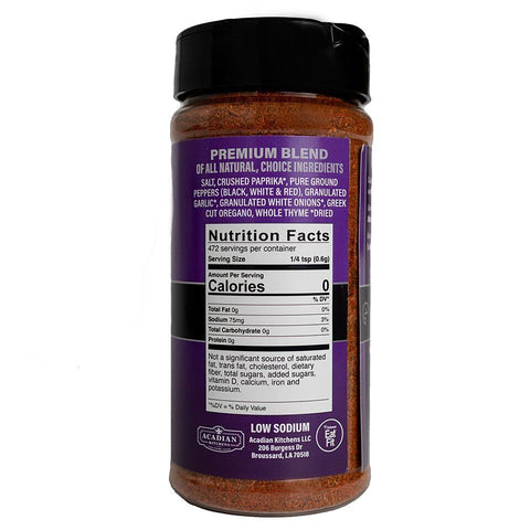 Product photography of an Acadian Kitchens Premium Blend spice jar with a vibrant purple label, displaying reddish-brown seasoning contents, zero calorie nutrition facts, and an Eat Fit logo from Broussard Louisiana