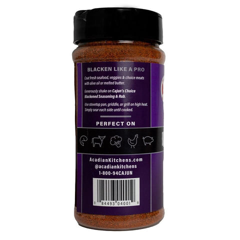 Photograph of a Cajun's Choice Blackened Seasoning & Rub bottle with a dark purple label displaying "BLACKEN LIKE A PRO" text, cooking instructions for seafood and meats, and line art icons representing shrimp fish crab chicken and pork, filled with reddish-brown seasoning on a white background