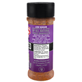Acadian Kitchens Low Sodium Premium Blend spice bottle features a vibrant purple label detailing all natural ingredients like paprika and oregano, along with an Ochsner Eat Fit logo