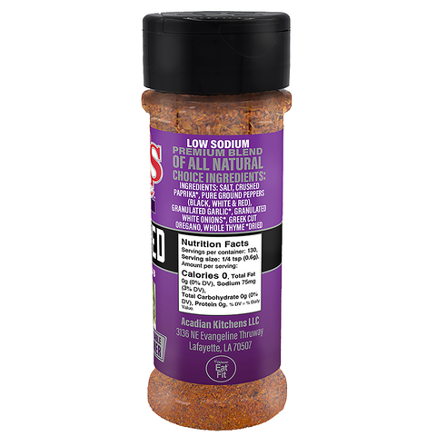 Acadian Kitchens Low Sodium Premium Blend spice bottle features a vibrant purple label detailing all natural ingredients like paprika and oregano, along with an Ochsner Eat Fit logo