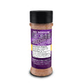 Digital product photograph of an Acadian Kitchens LLC seasoning shaker from Lafayette, LA, showcasing a brown granular blend with a purple and white label highlighting "NO SODIUM PREMIUM BLEND" including Louisiana Cane Sugar, Imported Cinnamon, and Natural Vanilla Bean Extract under a black flip-top lid