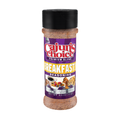Product Photography of a Cajun's Choice Premium Blend Breakfast Seasoning bottle featuring a vibrant purple label with a red "Cajun's Choice" logo, yellow "Breakfast Seasoning" text, and detailed illustrations of coffee and berry cereal, specifying Louisiana Cane Sugar and Natural Vanilla