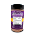 Product photography of Acadian Kitchens LLC No Sodium Premium Blend seasoning in a clear shaker bottle, with a vibrant purple and yellow label listing Louisiana cane sugar, imported cinnamon, natural vanilla bean extract, and 5 calories, from Lafayette LA