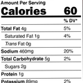 Product nutrition label displaying key nutritional information including 60 calories, 2 tbsp serving size, and 460mg of sodium