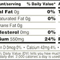 Digital graphic of a Nutrition Facts label showing 120 calories per serving, 550mg sodium at 24% daily value, and 0g added sugars