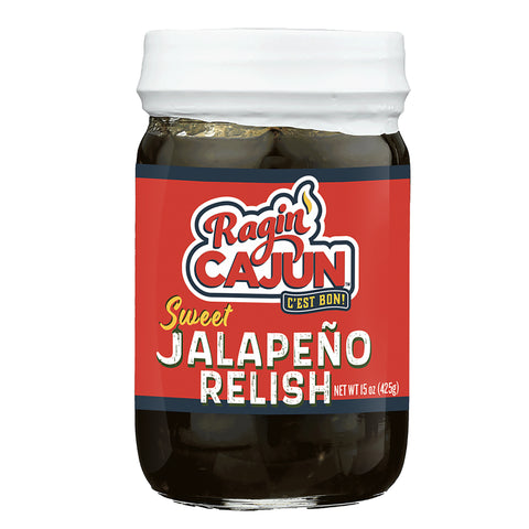 A clear glass jar of Ragin' Cajun Sweet Jalapeño Relish with a bold red label featuring white and yellow lettering, a green jalapeño graphic, and the dark green relish visible inside below a white lid