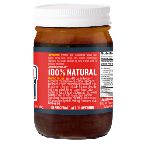 Amber glass jar of Ragin' Cajun Authentic Roux with a white lid and a prominent red and dark blue label detailing a gumbo recipe and proudly stating 100% NATURAL from Lafayette Louisiana