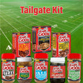 Product photography of a Ragin' Cajun Tailgate Kit displaying various red-packaged mixes and seasonings like Jambalaya, Chili & Beans, Sizzlin' Steak, and Sweet & Spicy Pickle slices against a vibrant green football field with visible yard lines and numbers