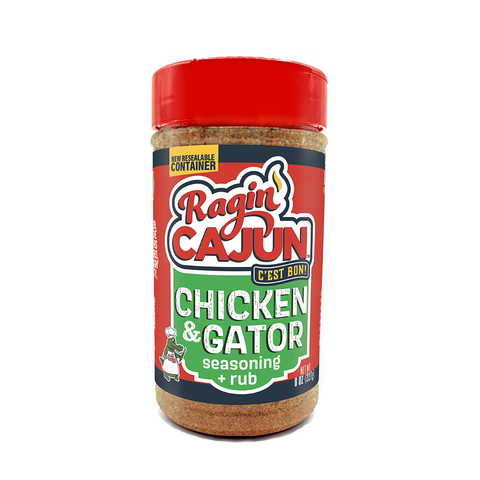 Product photo of a Ragin' Cajun Chicken & Gator Seasoning + Rub jar featuring a bright red label with the bold Ragin' Cajun logo, a gator chef mascot, and green 'Chicken & Gator' text
