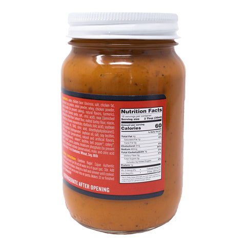 Product photography of a glass jar of orange-brown Ragin' Cajun Authentic Gumbo Base, featuring a white ribbed lid and a red label with a visible Nutrition Facts panel and 'Refrigerate After Opening' text on a white background