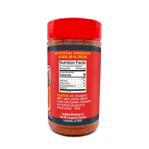 Digital photograph of a red Acadian Kitchens spice jar with a red cap, featuring the Nutrition Facts panel showing 0 calories, and ingredients including red peppers, garlic, and chipotle powder
