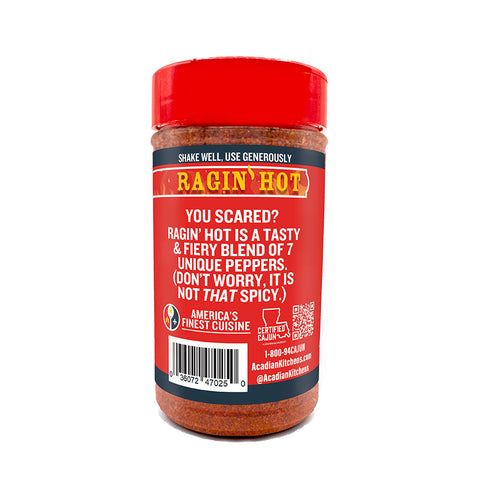 A Ragin' Hot seasoning jar with a bright red cap features the text "Ragin' Hot" above a description of its tasty and fiery blend of seven unique peppers, prominently displaying America's Finest Cuisine and Certified Cajun logos by Acadian Kitchens