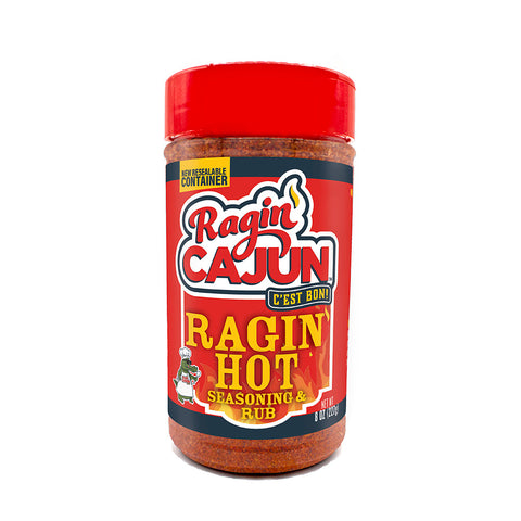 Product photograph of a Ragin' Cajun Ragin' Hot Seasoning & Rub bottle featuring a bright red cap and label, a cartoon crawfish chef character, and bold flame graphics