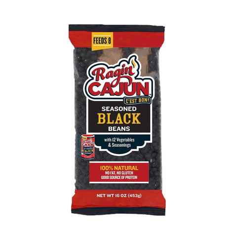 Product packaging Ragin' Cajun Seasoned Black Beans bag with a prominent red and black design featuring a yellow flame logo a Feeds 8 banner and the 100% Natural declaration