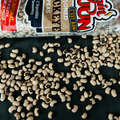 Bag of Ragin' Cajun Blackeye Peas with visible beans on a dark surface