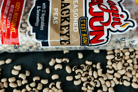Bag of Ragin' Cajun Blackeye Peas with visible beans on a dark surface