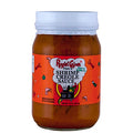 Product photo of a glass jar of Ragin' Cajun Fixin's Shrimp Creole Sauce with a bright orange label, white lid, "Ready in 25 minutes" text, and a graphic of a cauldron over flames surrounded by shrimp and vegetable illustrations