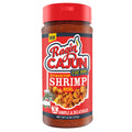 Product photo of Ragin' Cajun Stovetop Shrimp Boil seasoning in a clear bottle with a bold red label, prominently featuring a cartoon alligator chef, the Ragin' Cajun logo with a flame, and an appetizing image of seasoned shrimp skewers with lemon wedges