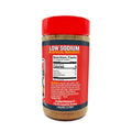 Product photography of Acadian Kitchens LLC Low Sodium seasoning jar from Lafayette LA with a vibrant red lid and label featuring nutrition facts showing 0 calories and key ingredients like black truffle mushroom and smoked paprika